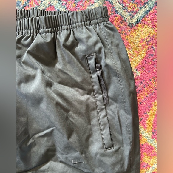 Nike | Women’s Black Nike Golf Storm Fit Pull On Rain Pants, Snap Hem, size M - Picture 9 of 15